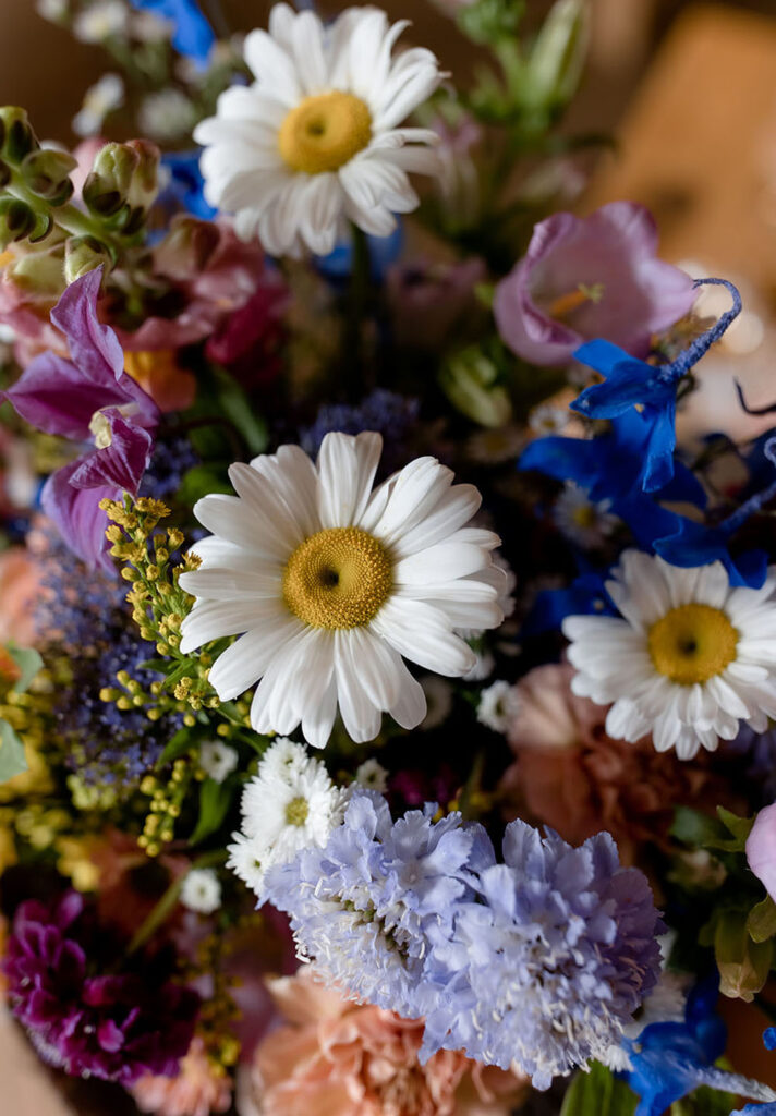 Summer wedding at Kulfuschgerhof, Dolomites, with wild flowers