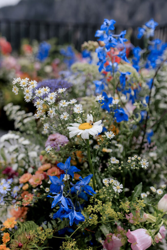 Summer wedding at Kulfuschgerhof, Dolomites, with wild flowers