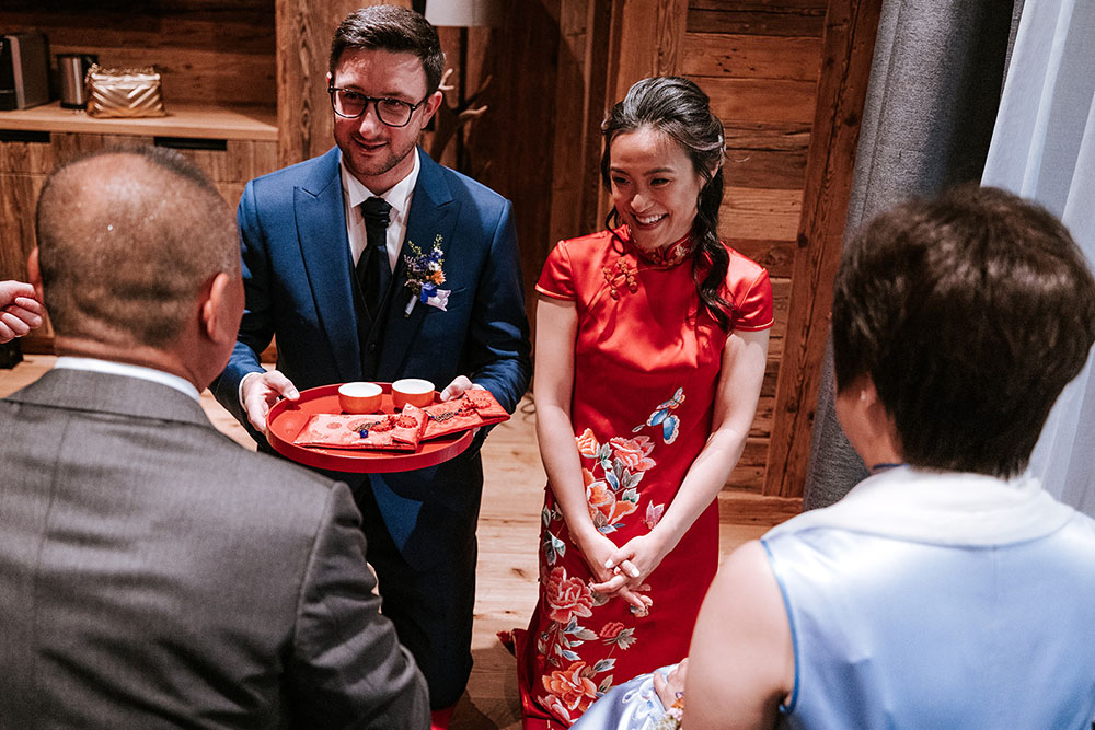 Wedding in the Dolomites with wildflowers - tea ceremony at Kolfuschgerhof