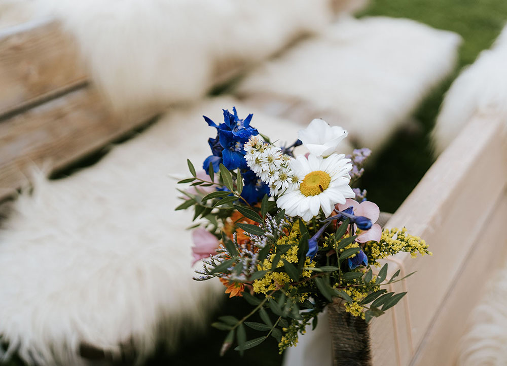 Wedding in the Dolomites with wildflowers - getting ready at Kolfuschgerhof