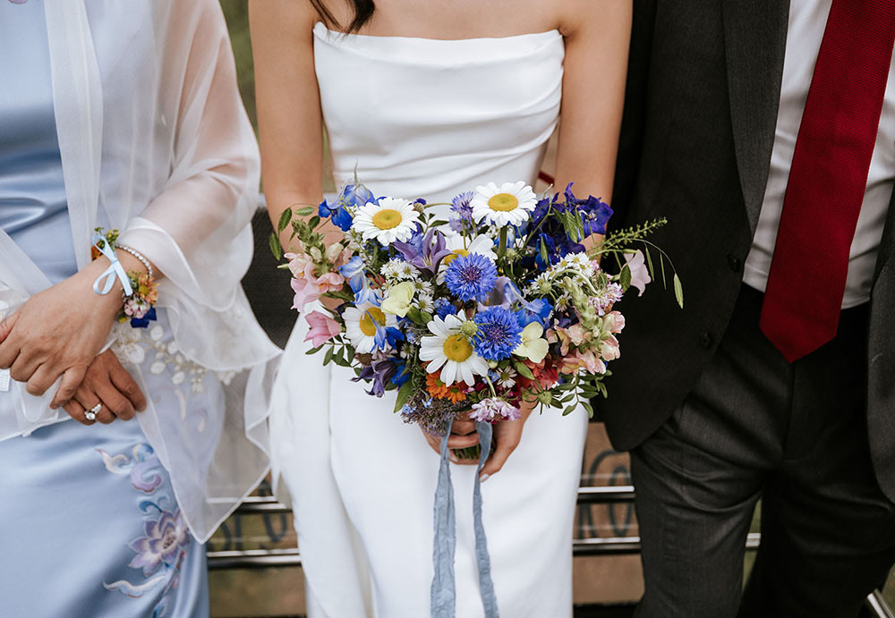 Wedding at Col Pradat in the Dolomites with wildflowers