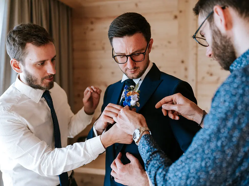 Wedding in the Dolomites with wildflowers - getting ready at Kolfuschgerhof