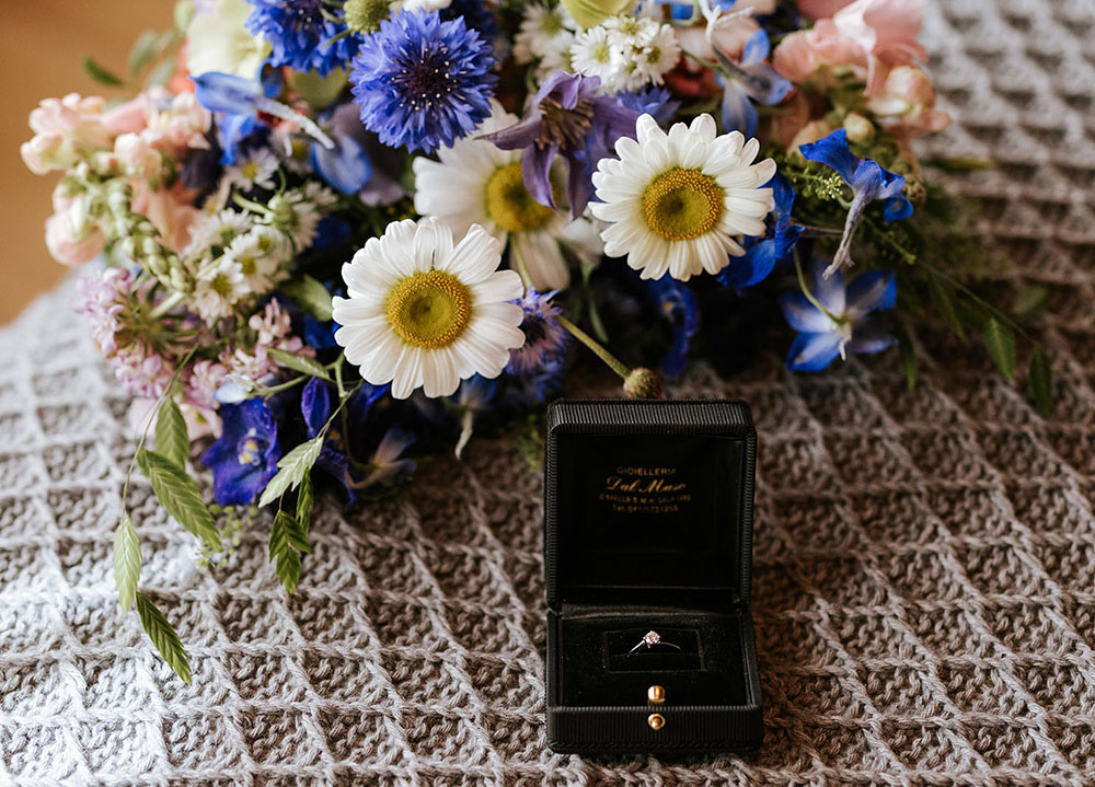 Wedding in the Dolomites with wildflowers - getting ready at Kolfuschgerhof